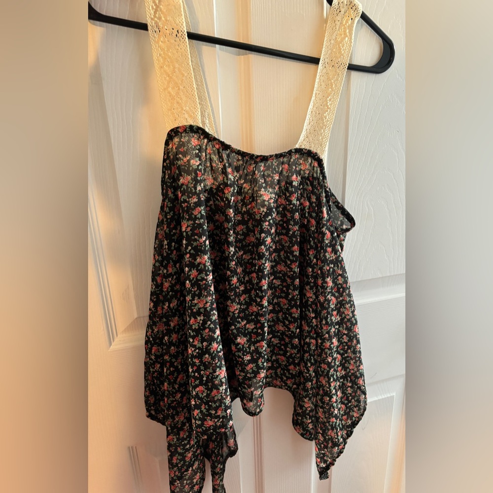 Great tank top very comfortable. Great condition size small